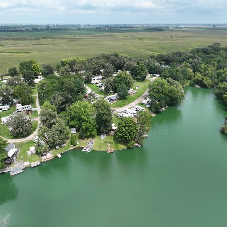 Aerial view of pond and RV sites at Shady Lakes RV Resort